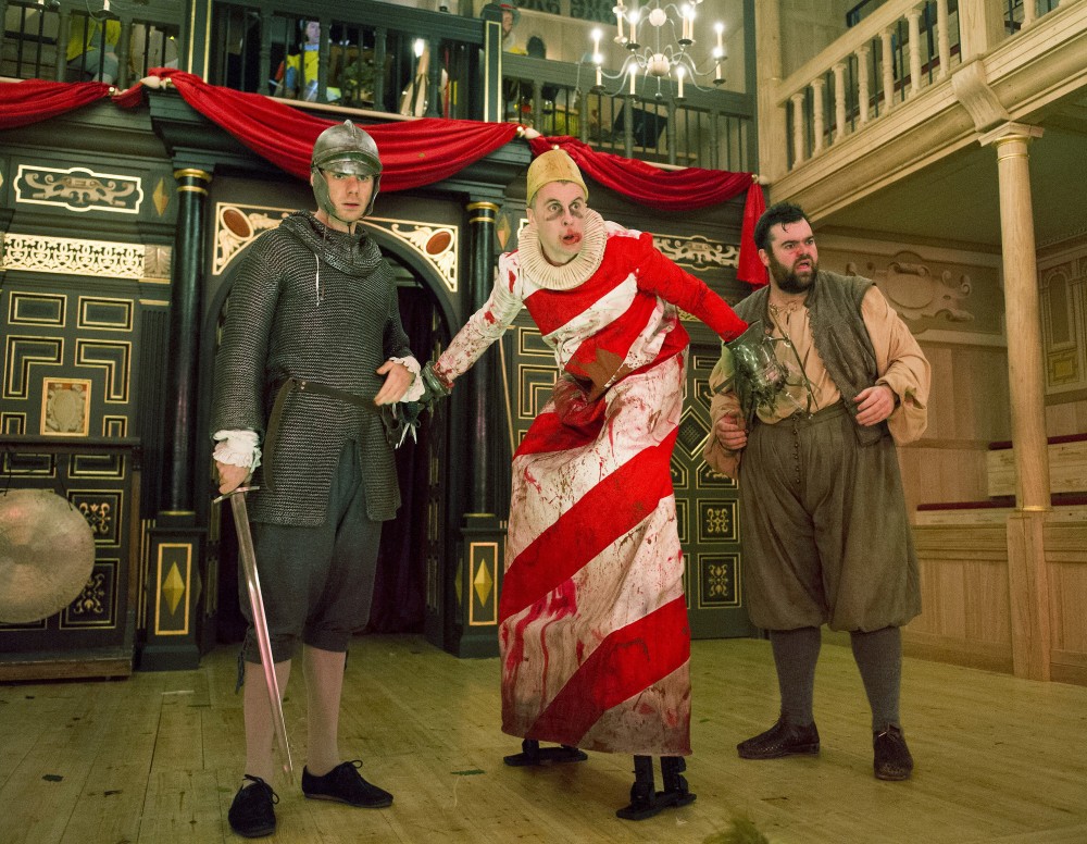 Matthew Needham (Rafe), Brendan O'Hea (Host) and Dean Nolan (George) in The Knight of the Burning Pestle at the Sam Wanamaker Playhouse. Photo: Alastair Muir